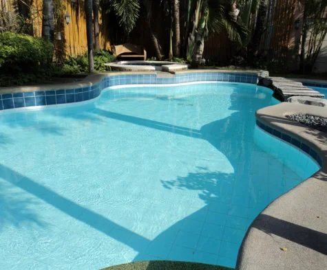 Routine pool cleaning and maintenance